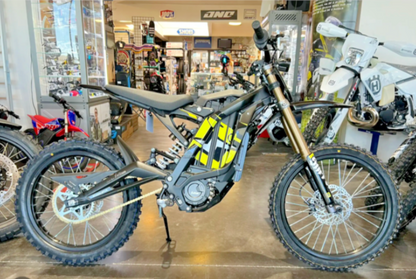Sur-Ron Light B X 2026 — in showroom side view